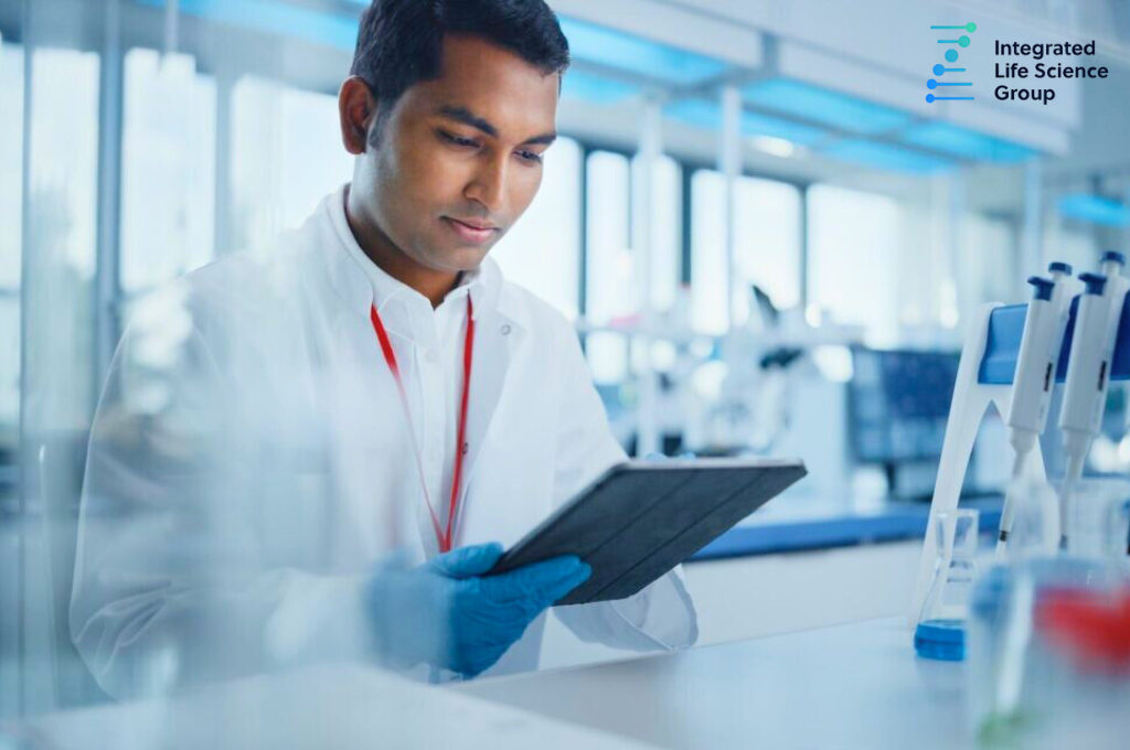 man in a lab wearfing a labcoat holding a clipboard